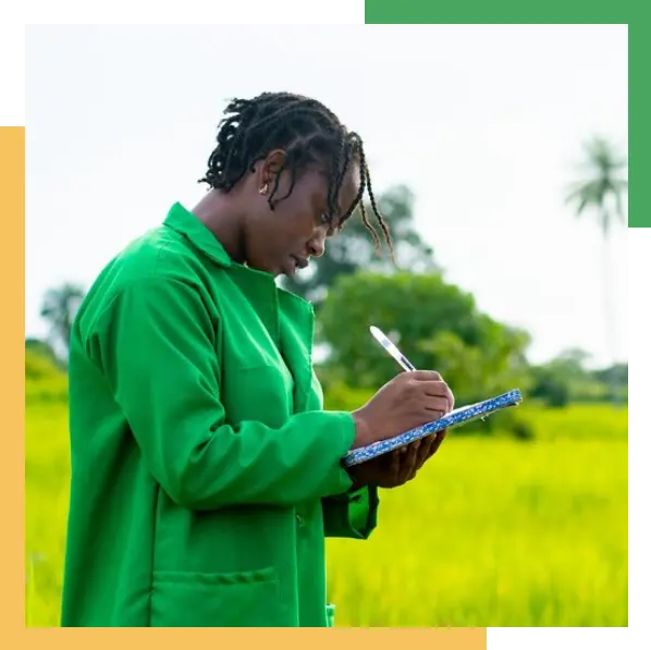 Agricultural Worker documenting records on book