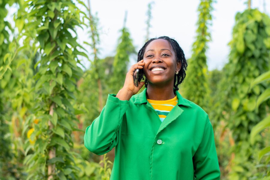 cheerful-african-farmer-talking-on-phone